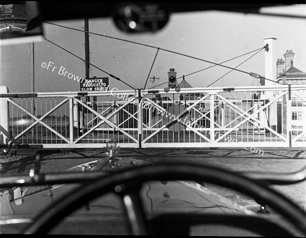 LEVEL CROSSING GATES THROUGH WINDSCREEN